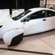 E1a, at the unveiling ceremony, with the chassis of E1b to the right. Photo courtesy Elio Motors